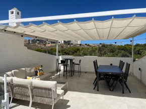 Townhouse med takterrass i Costa Hispania